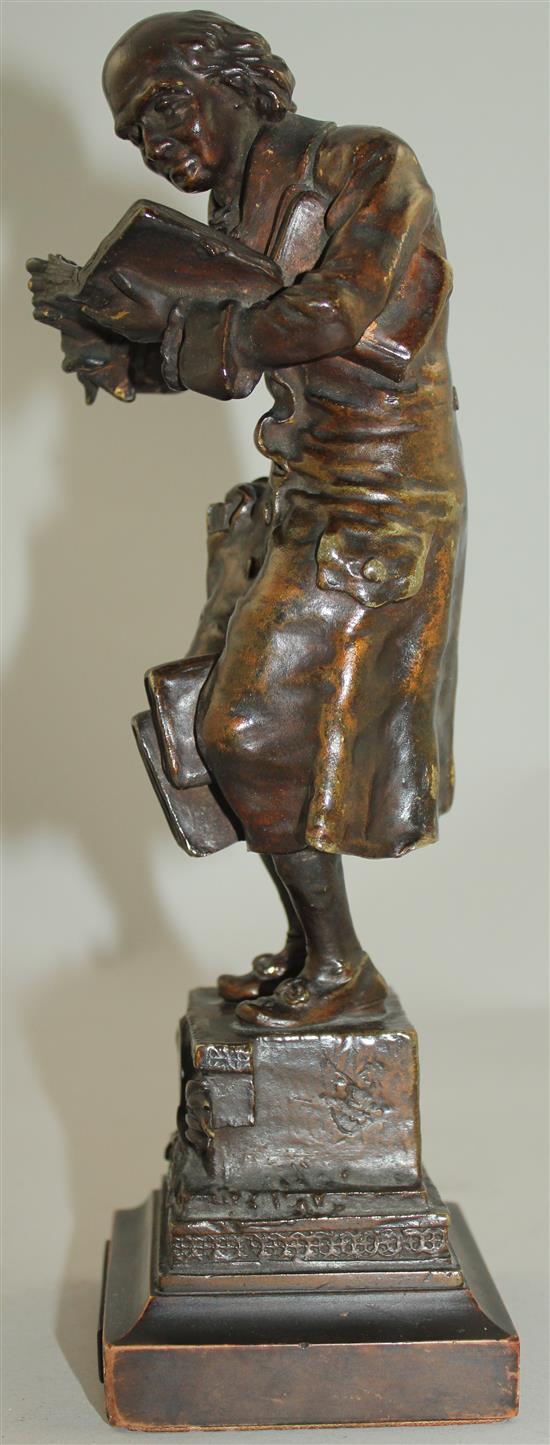 Karl Kauba (1865-1922). A bronze A Bookworm, 1922, 10in.